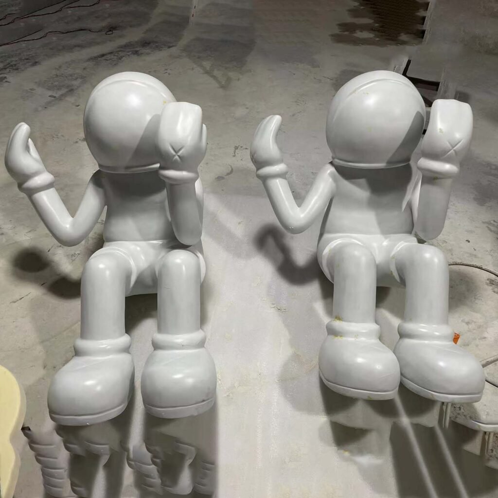 stone carvings and sculptures of children